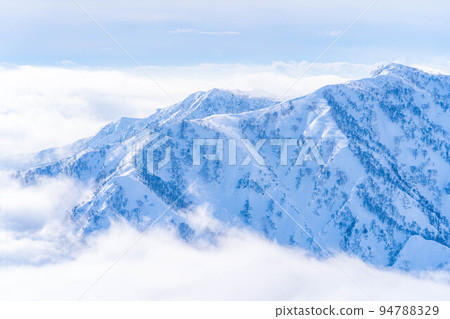 [Snow mountain material] Mountain climbing scenery of Mt. Karamatsu in winter [Nagano Prefecture] 94788329