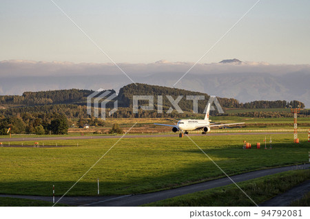 Asahikawa Airport at dusk Airplane taking off and Shujitsu Hill Asahikawa City, Hokkaido (Higashi Kagura) Asahikawa Airport at dusk Airplane taking off and Shujitsu Hill Asahikawa City, Hokkaido (Higashi Kagura) 94792081