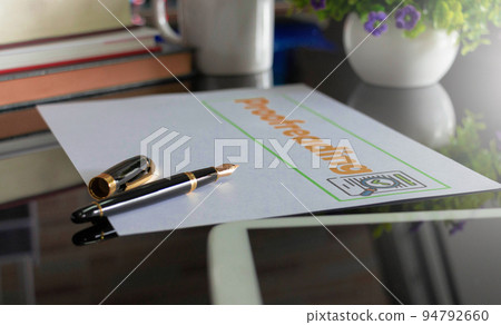 pen on paper in proofreading service office 94792660