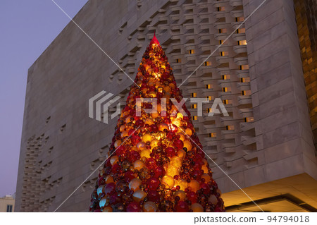 Large Christmas tree made of glass balls made by Maltese glassblowers to decorate capital of Malta Large Christmas tree made of glass balls made by Maltese glassblowers to decorate capital of Malta 94794018
