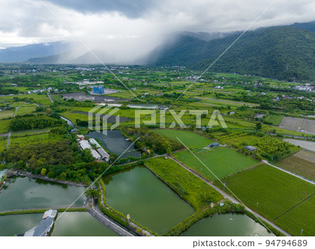 Top view of fish pond and field in Hualien of Taiwan 94794689