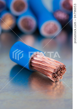 Scrap of Electric Copper Cable on Metal Surface Scrap of Electric Copper Cable on Metal Surface 94796053