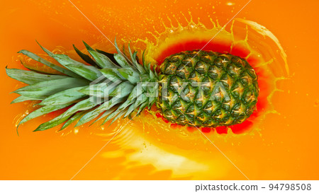 Freeze Motion Shot of Splashing Fresh Pineapple. Filmed on High Speed Cinematic Camera at 1000fps. Freeze Motion Shot of Splashing Fresh Pineapple. Filmed on High Speed Cinematic Camera at 1000fps. 94798508