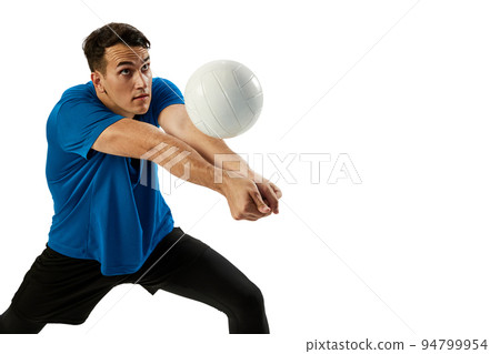 Closeup of young man, volleyball player playing volleyball isolated on white studio background. Sport, gym, team sport, challenges 94799954
