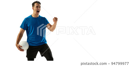 Winner emotions. Young male volleyball player with ball shouting isolated on white studio background. Success, ad, sport. Flyer 94799977