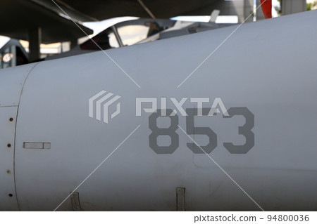 Painted number on modern war plane, number sign on fuselage of modern jet fighter, Number decal on aircraft. Painted number on modern war plane, number sign on fuselage of modern jet fighter, Number decal on aircraft. 94800036