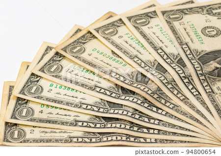 Closeup view of used one american dollar bills. Closeup view of used one american dollar bills. 94800654