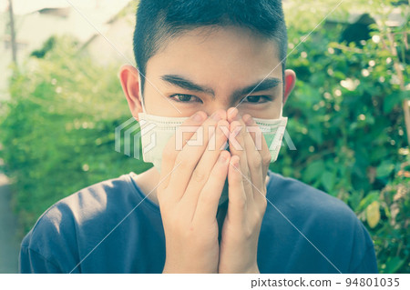 Coronavirus Covid-19 virus concept, Portrait of Asian boy wearing a protective mask against the coronavirus. Only those who are strong and well-motivated are safe from contracting the coronavirus. Coronavirus Covid-19 virus concept, Portrait of Asian boy wearing a protective mask against the coronavirus. Only those who are strong and well-motivated are safe from contracting the coronavirus. 94801035