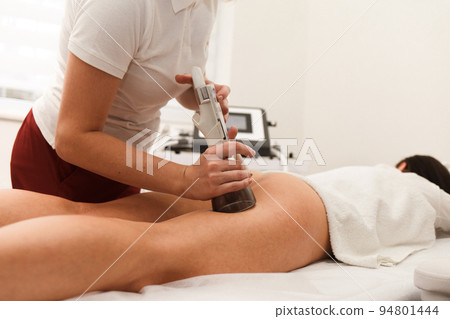 The procedure for vacuum anti-cellulite massage of the buttocks with a special device. The procedure for vacuum anti-cellulite massage of the buttocks with a special device. 94801444