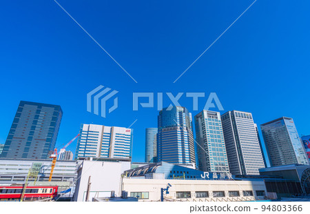 Tokyo cityscape in Japan September. Overlooking Shinagawa Station and office buildings = September 26 94803366