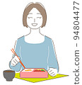woman eating bento for lunch 94804477