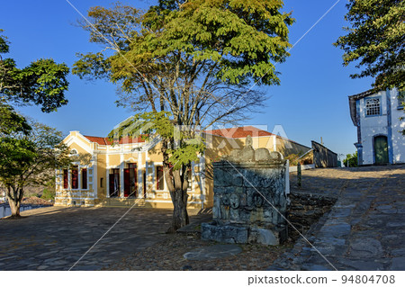 Neoclassical construction in an old historic square with a drinking fountain in Diamantina 94804708