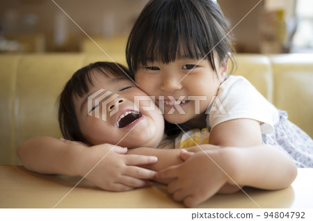 friendly sisters playing 94804792