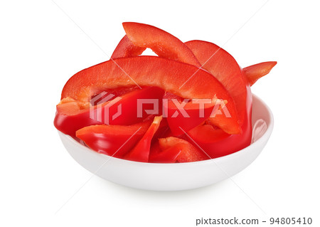 slices of red sweet bell pepper in ceramic bowl isolated on white background slices of red sweet bell pepper in ceramic bowl isolated on white background 94805410