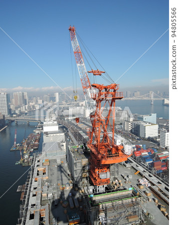 Concrete placement by tower crane 94805566