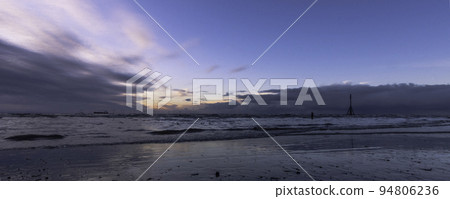 Sunset on Crosby Beach in winter, Crosby, UK Sunset on Crosby Beach in winter, Crosby, UK 94806236