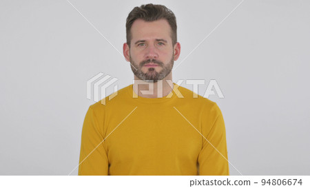 Serious Middle Aged Man Looking at the Camera , White Background 94806674