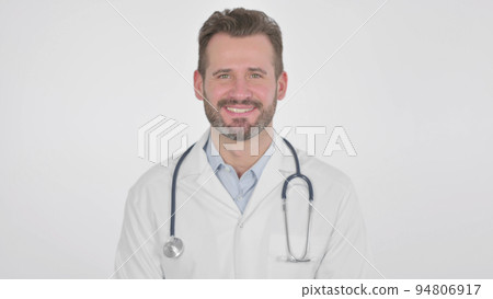 Middle Aged Doctor Smiling at the Camera, White Background 94806917