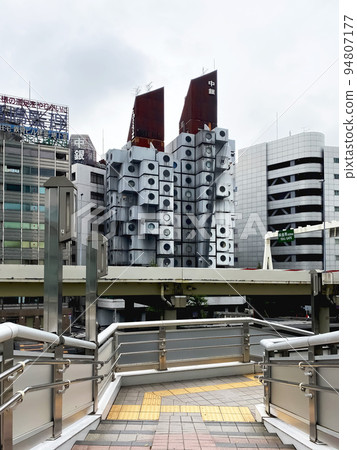 The front of the Nakagin Capsule Tower, a masterpiece of Japanese Metabolism that was built in Ginza, Tokyo 94807177