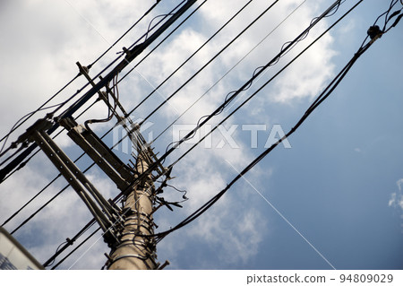 Electric wire, utility pole, sky, blue sky, cloud, landscape, looking up 94809029