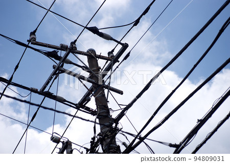 Electric wire, utility pole, sky, blue sky, cloud, landscape, looking up 94809031