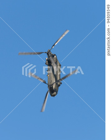 Blue sky and RAF Chinook HC2 helicopter Blue sky and RAF Chinook HC2 helicopter 94809349