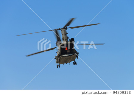 Blue sky and RAF Chinook HC2 helicopter 94809358