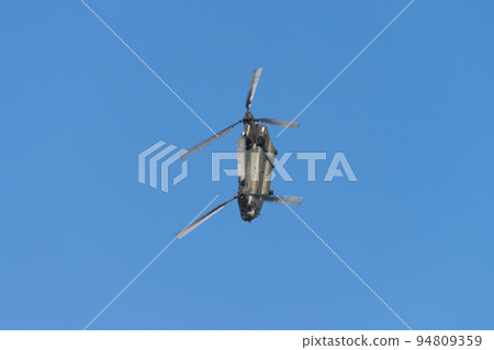 Blue sky and RAF Chinook HC2 helicopter Blue sky and RAF Chinook HC2 helicopter 94809359