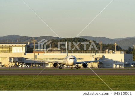 Asahikawa Airport at dusk Airplane taxiing Asahikawa City, Hokkaido (Higashi Kagura) Asahikawa Airport at dusk Airplane taxiing Asahikawa City, Hokkaido (Higashi Kagura) 94810001