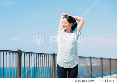 Women stretching Women stretching 94811593