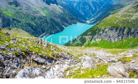 Beautiful alpine walley with azure blue water dam 94815506