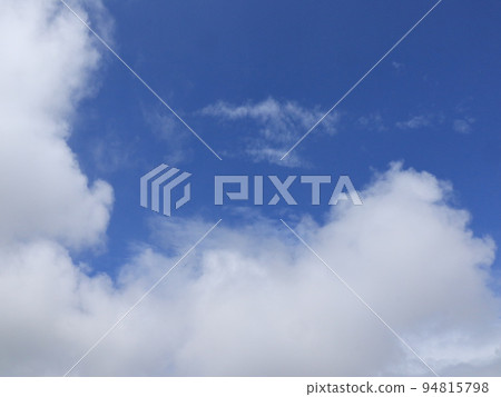 Landscape with white cotton clouds and blue sky 94815798