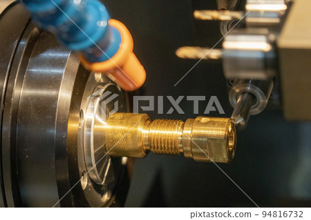 The multi-tasking CNC lathe machine swiss type milling the brass shaft parts. The multi-tasking CNC lathe machine swiss type milling the brass shaft parts. 94816732