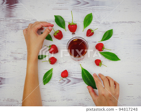 Fresh organic strawberries , over dark background Fresh organic strawberries , over dark background 94817248