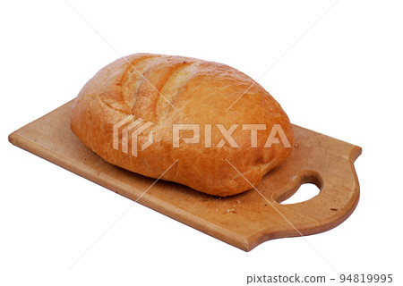 Bread lies on a wooden cutting board on a white background. 94819995