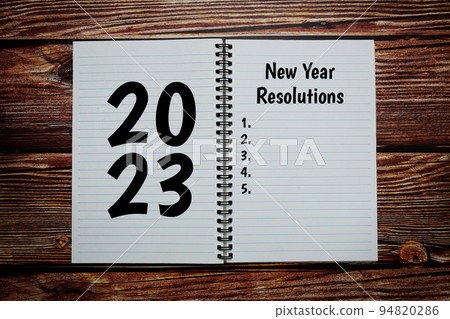2023 New Year Resolutions text message written on wooden background 2023 New Year Resolutions text message written on wooden background 94820286