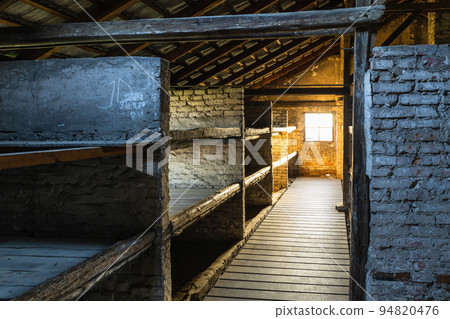 Barrack for prisoners in the Auschwitz - Birkenau concentration camp. Oswiecim, Poland, 17 July 2022 94820476