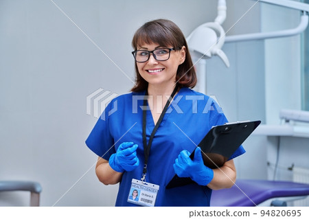 Portrait of female doctor dentist in office Portrait of female doctor dentist in office 94820695