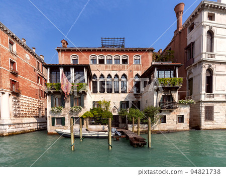 Venice. Old stone houses along the Grand Canal on a sunny morning. Venice. Old stone houses along the Grand Canal on a sunny morning. 94821738