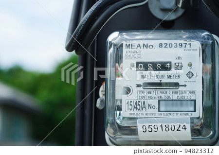 Bangkok, Thailand - May 15, 2022 Electric measuring power meter for energy cost at home and office. 94823312