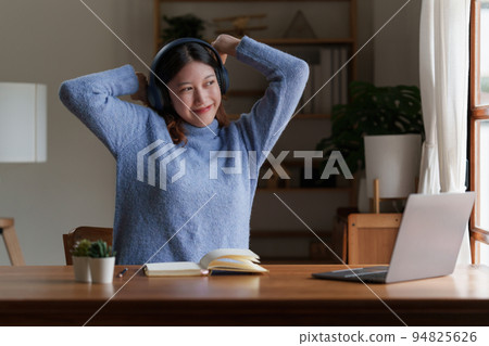 Young college student studying by video call E-learning, online, education concept 94825626