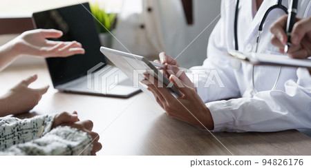 Doctor explain to patient about health care. Medicine and health care and insurance concept 94826176