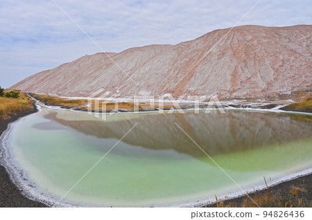 Potash waste heaps with toxic lake 94826436