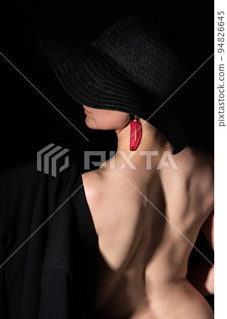 Thirty year old white lady posing with a black hat, naked back and a black jacket Thirty year old white lady posing with a black hat, naked back and a black jacket 94826645