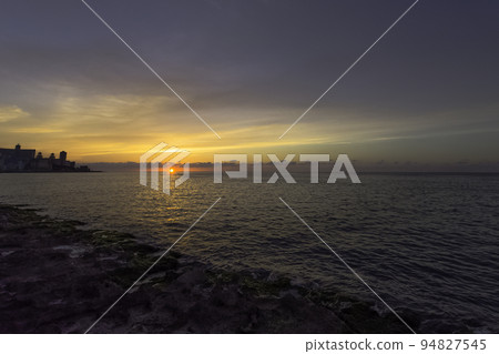 Sunset over Malecon and Atlantic Ocean - Havana 94827545