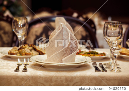 Ceramic tableware on the table 94829350