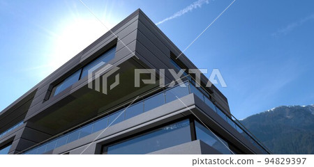 Bottom view of the corner of a modern country house finished with aluminum panels. The balcony is enclosed with glass panels. 3d render. 94829397