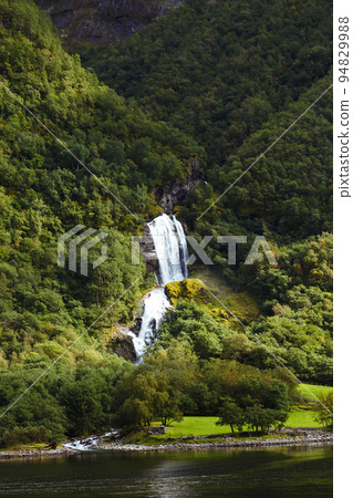 Norway landscape with big waterfall. Picturesque landscape mountains of Norway. Travelling. 94829988