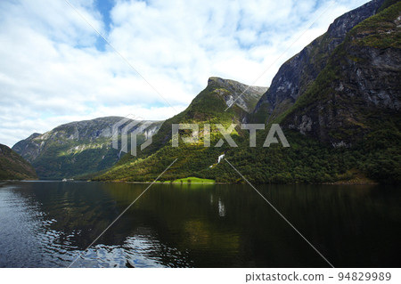 Picturesque landscape mountains of Norway. Beautiful view of the lake. Rocky shore of mountain lake. 94829989