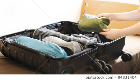 Suitcase luggage arrangement travel business trip 94831404